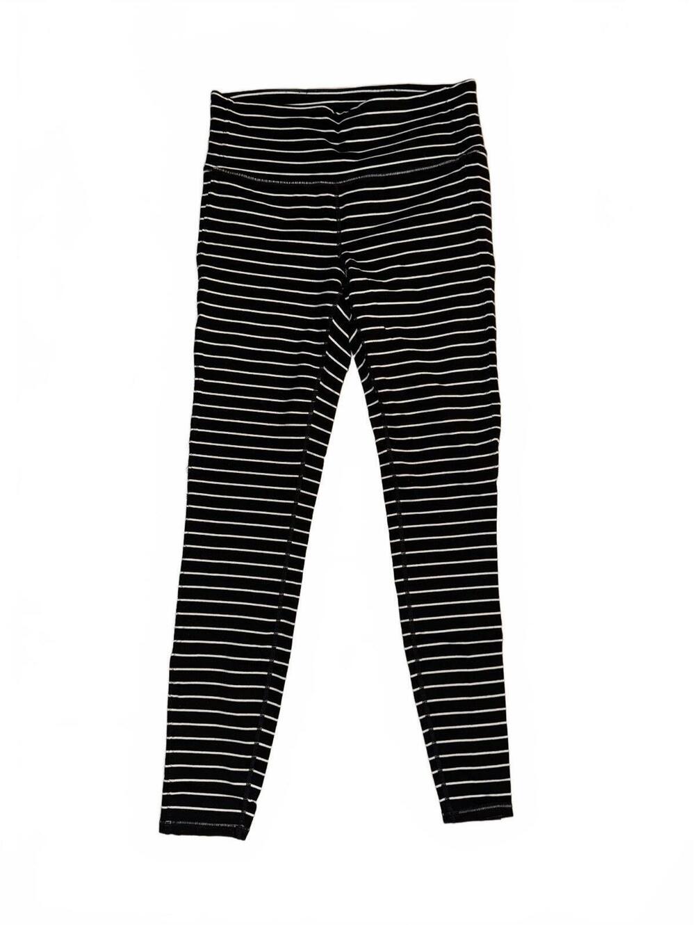 Women’s Athleta black and white striped yoga pants/ leggings Size Medium